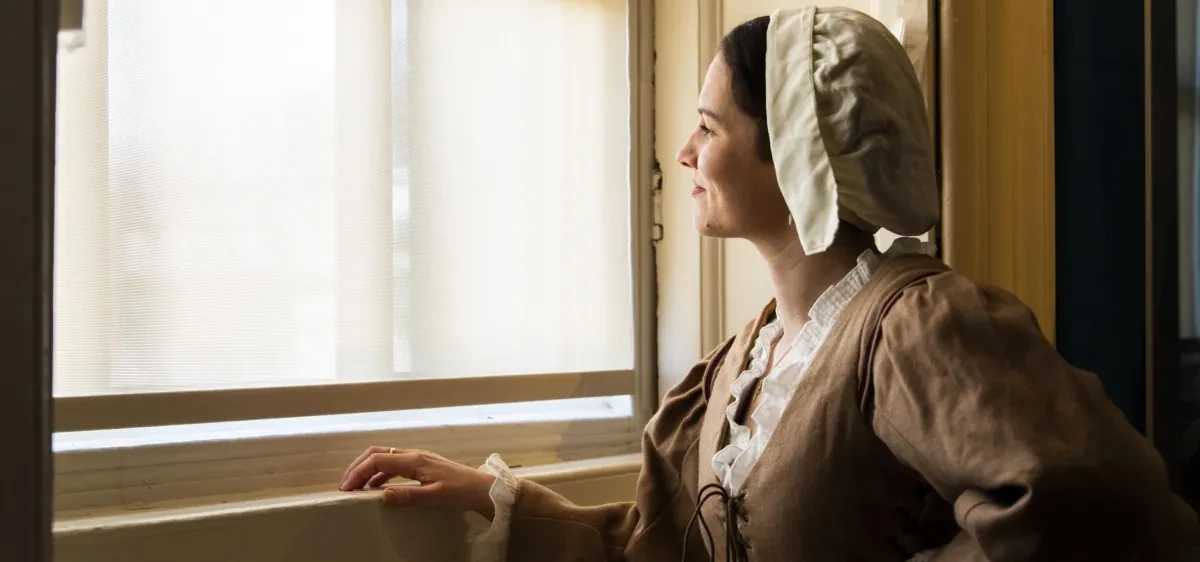Mistress Babbington looking out of a window at the Queen's House