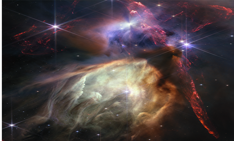 Red dual opposing jets coming from young stars fill the darker top half of the image, while a glowing pale-yellow, cave-like structure is bottom center, with a bright star at its centre.