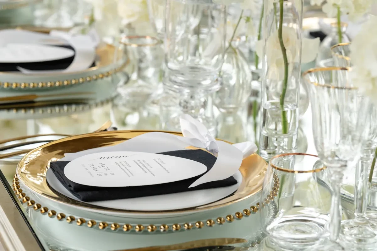 close up shot of the tablescape and stationary.