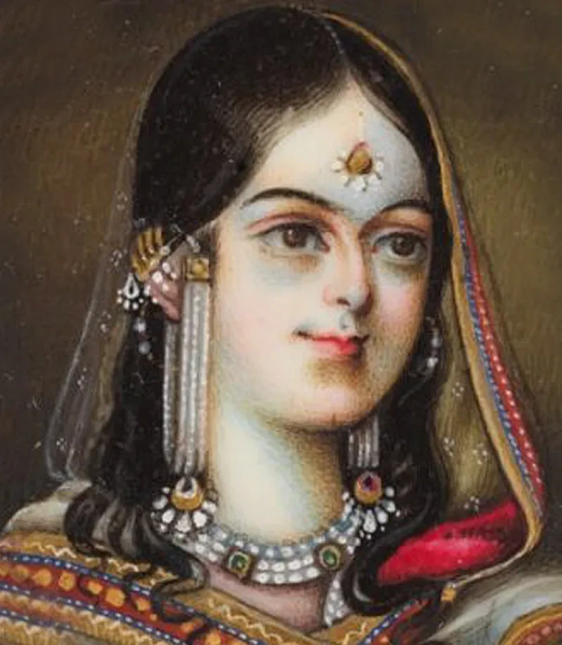 Close up of a miniature of Zeenat Mahal wearing jewelled clothing