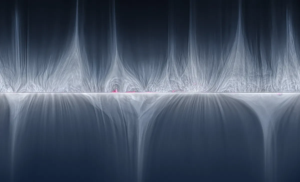A white strip of light bisects a dark blue background, with waves of light bouncing up and down the central line