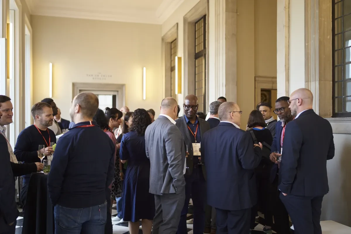 Guests networking in The Orangery at Queen's House