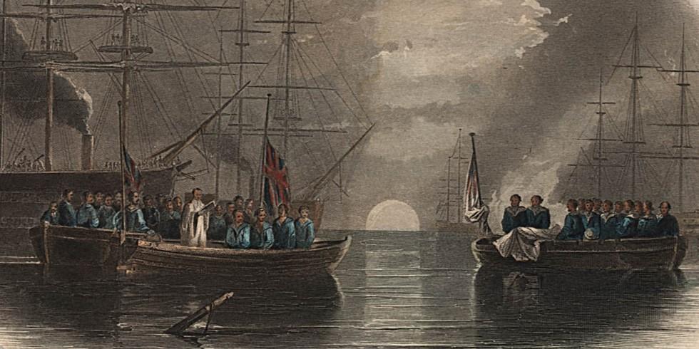 two boats full of sailors. A chaplain is standing in one of the boats, presiding over a burial at sea.