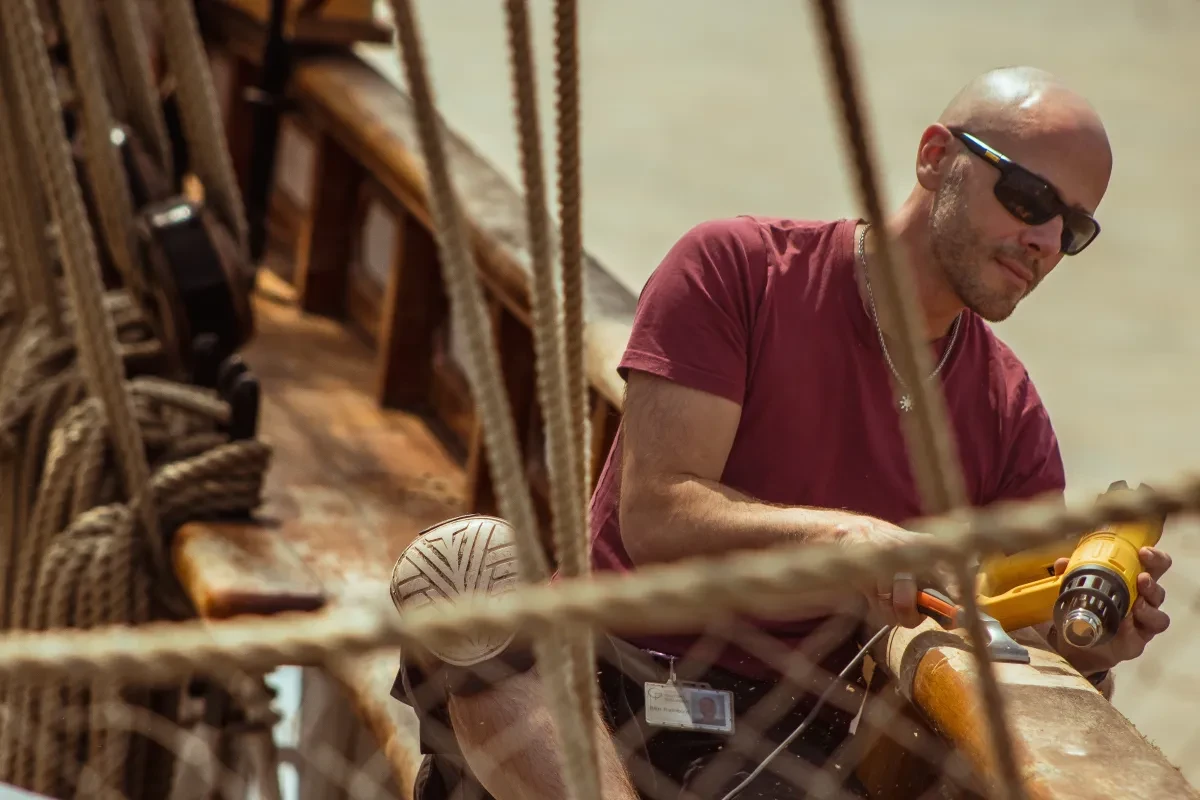 Photo of Ben Rainbird on a boat