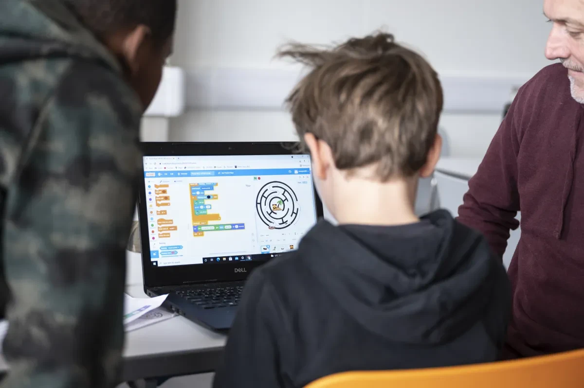 A child looks at a computer screen