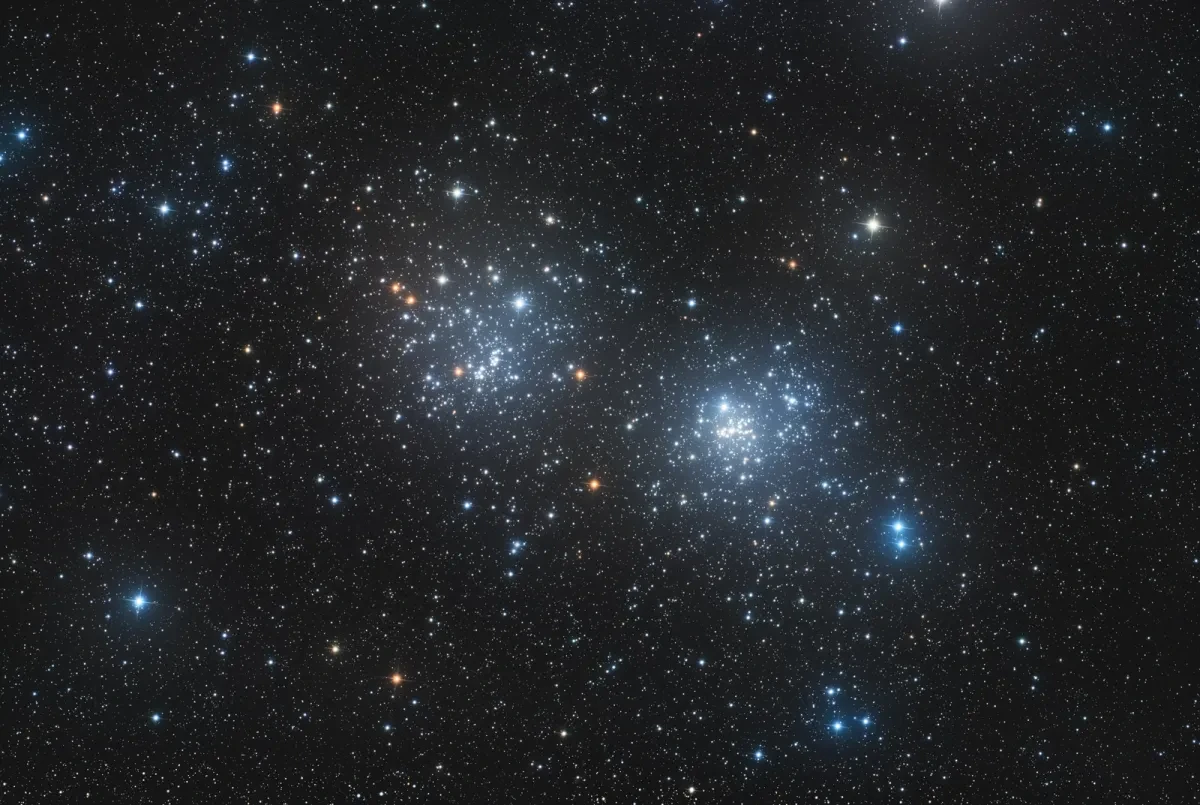 Double cluster of blue glittering stars