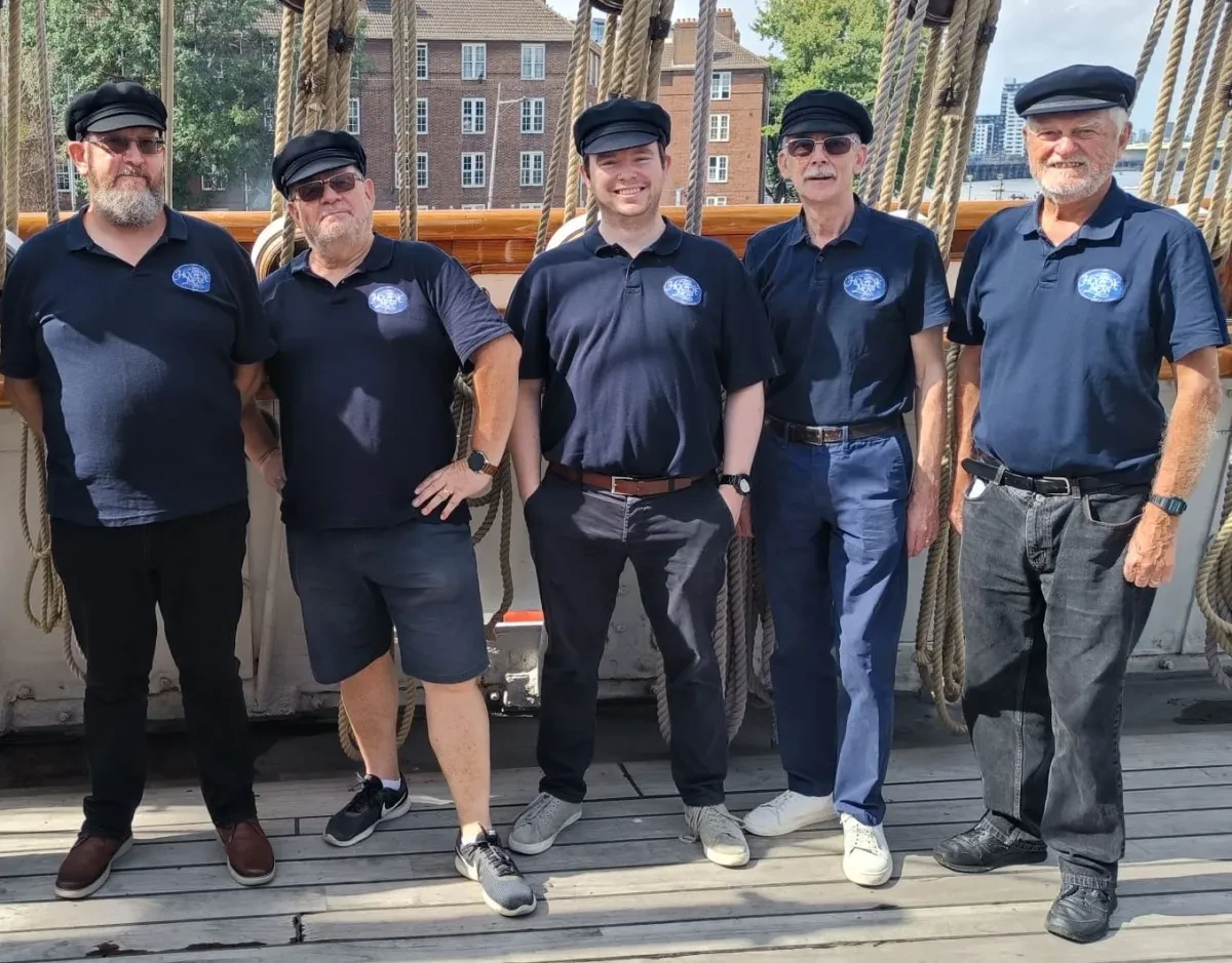 Photo of HogEye Men on deck of Cutty Sark