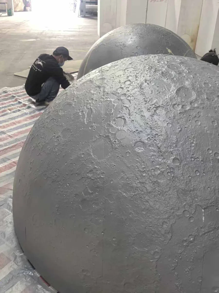 Sections of artwork Mirror Moon being constructed