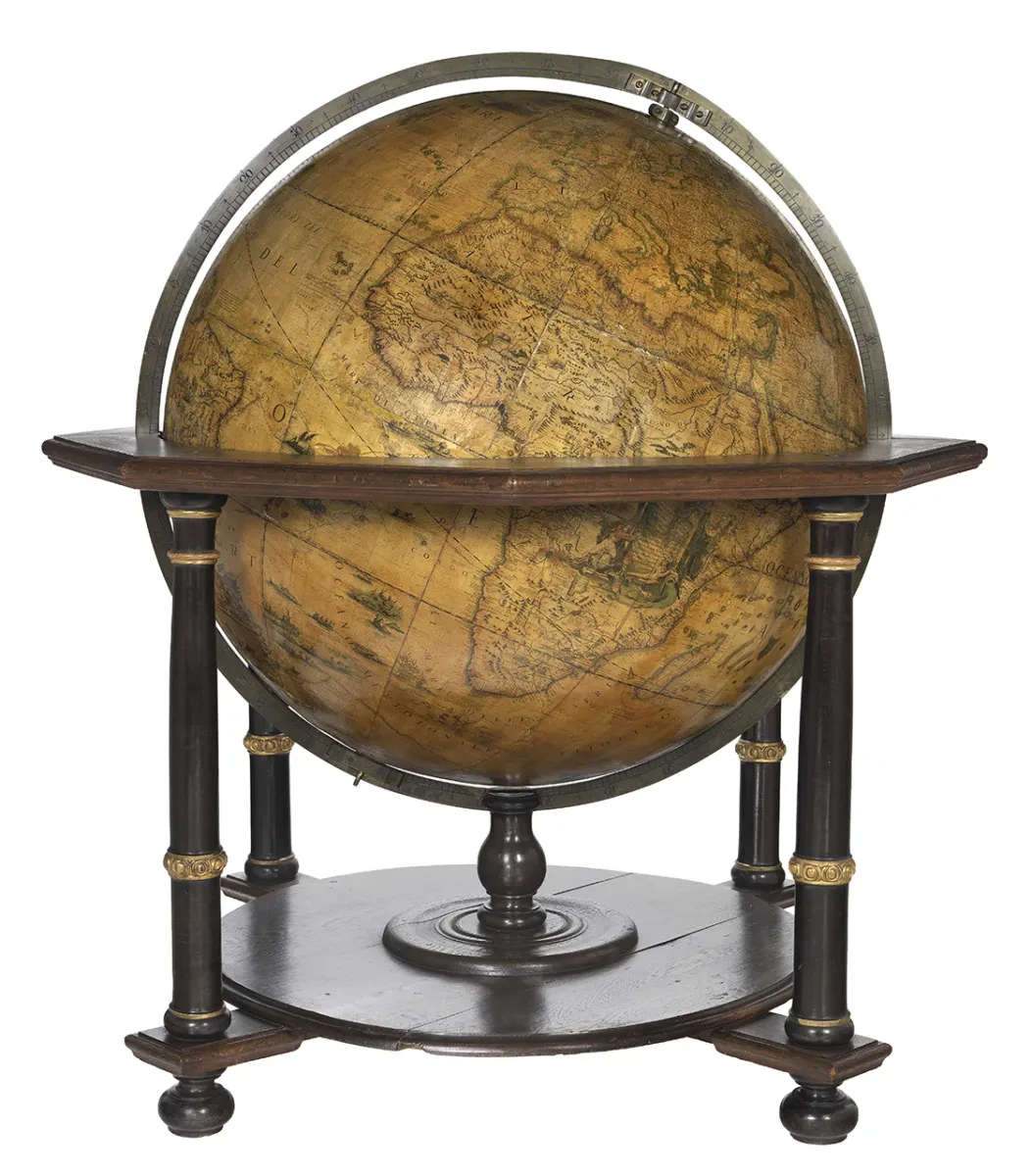 Terrestrial floor globe. Geographical details on the sphere include two compass cards, one with Italian names and the other with Dutch names of the compass points. California is represented as an island.