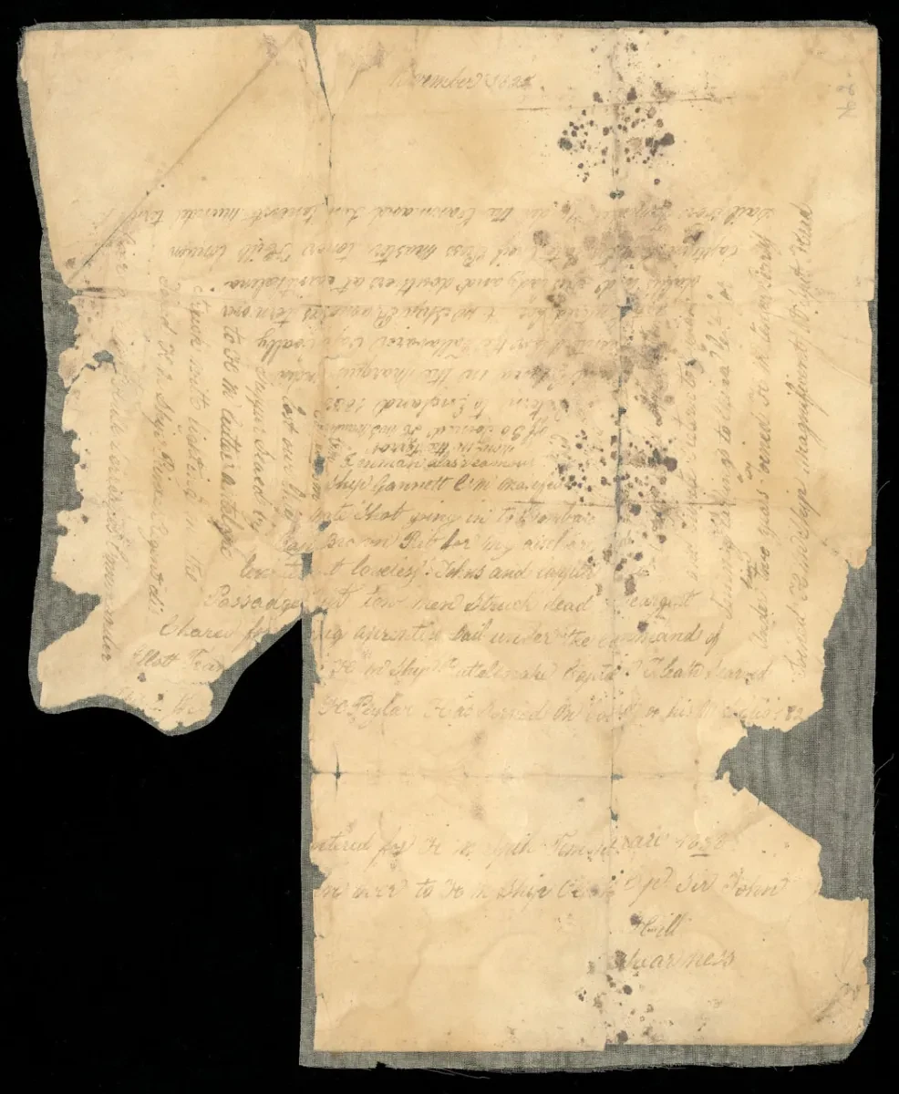 A document from the Peglar wallet, damaged and torn, with writing running in various directions around the page 