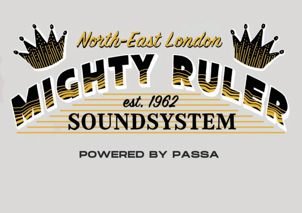 Logo for North-East London Mighty Ruler Sound System. The design features two black-and-gold crowns framing the words "North-East London" above large arched text reading "Mighty Ruler" in bold black letters with gold wave patterns. Below, it reads "est. 1962" and "Soundsystem" over horizontal gold lines, with "Powered by Passa" centred underneath. The colour palette is black, gold and white on a light grey background.