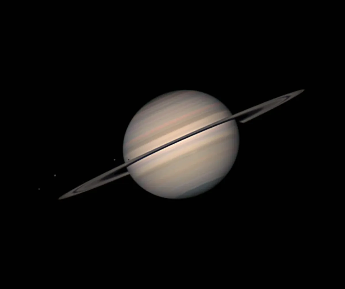 Image of Saturn with rings and moons