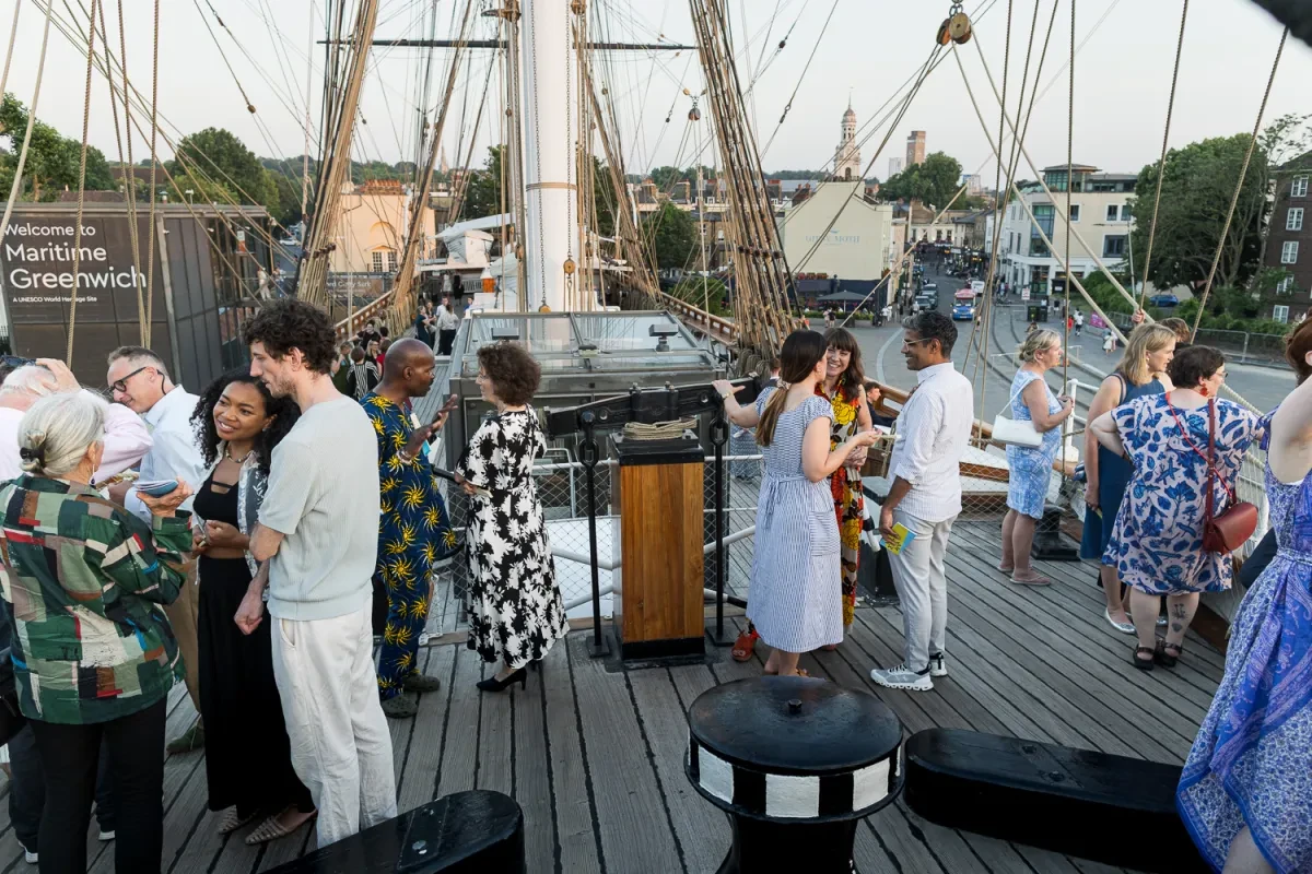 crowd mingling on cutty sark's top deck