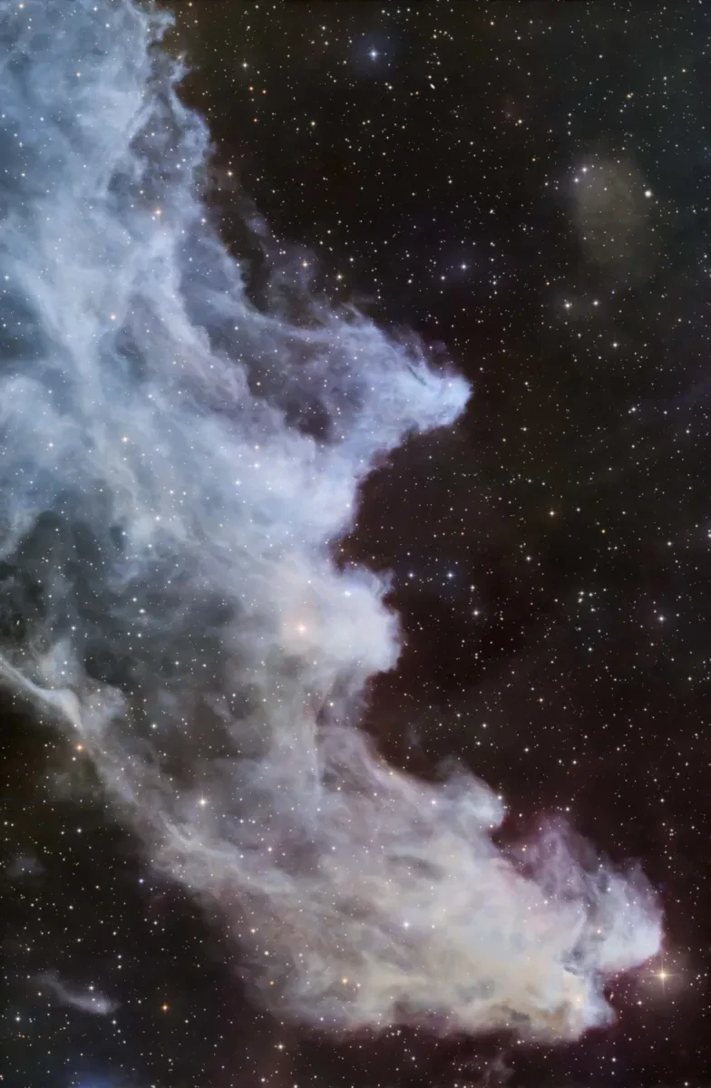 Ethereal blue clouds of the Witch Head Nebula