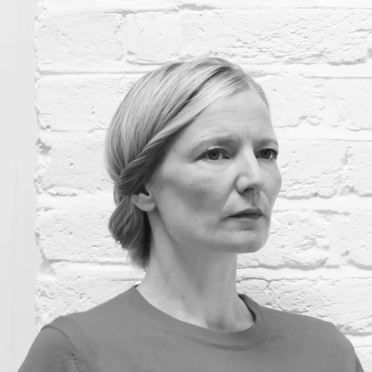 Black and white headshot of Gitta Gschwendtner