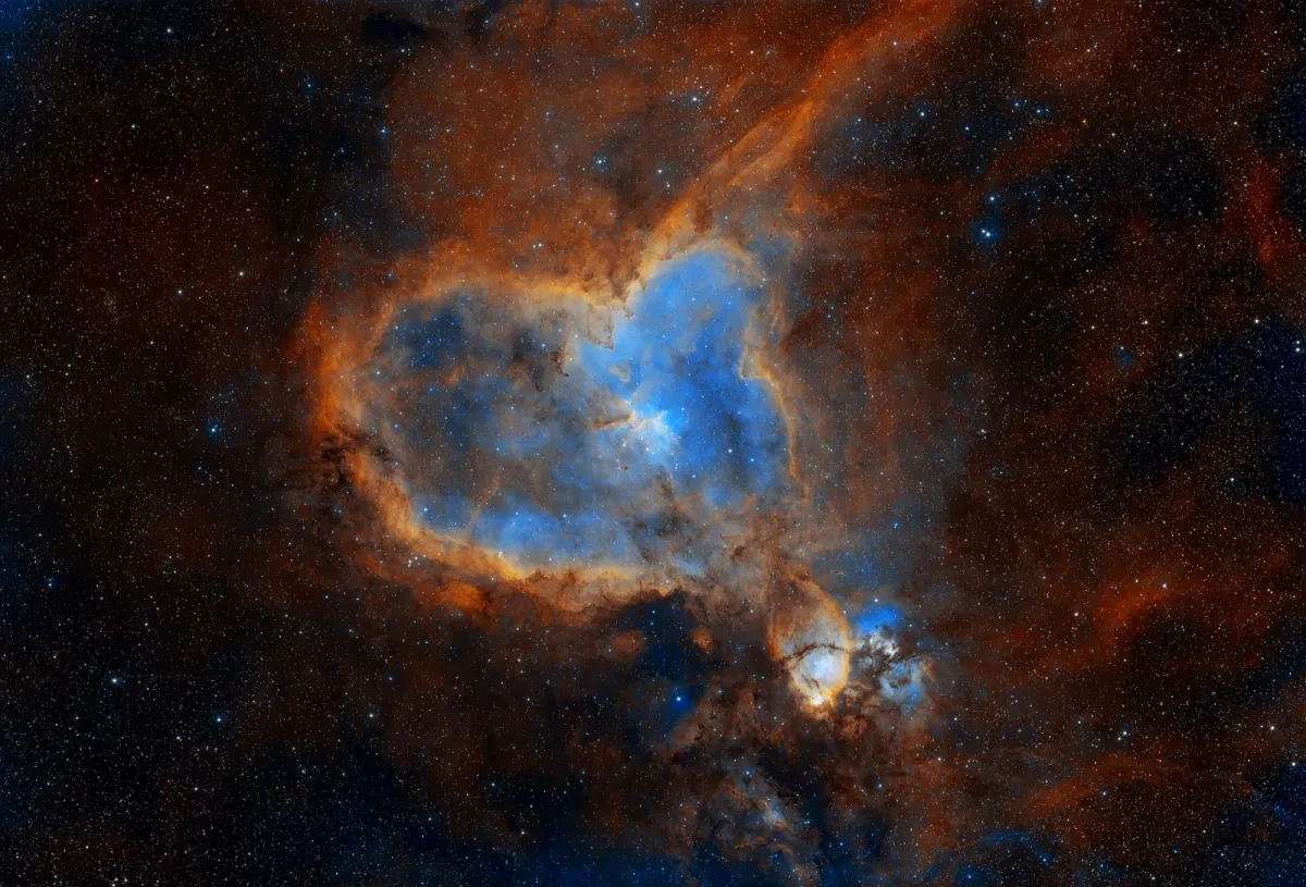The Heart Nebula in blue and orange