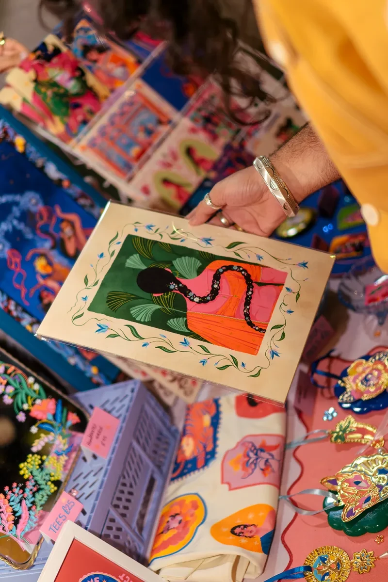 An image of a photo frame against a colourful backdrop