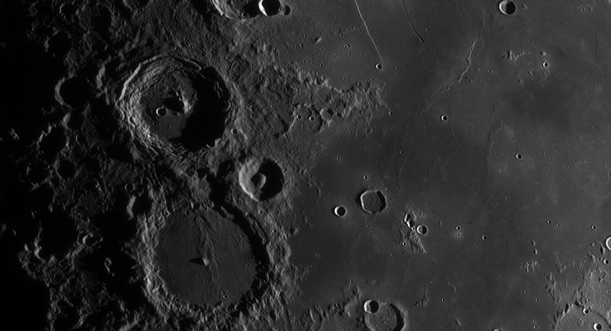 Close up image of a number of craters on the Moon