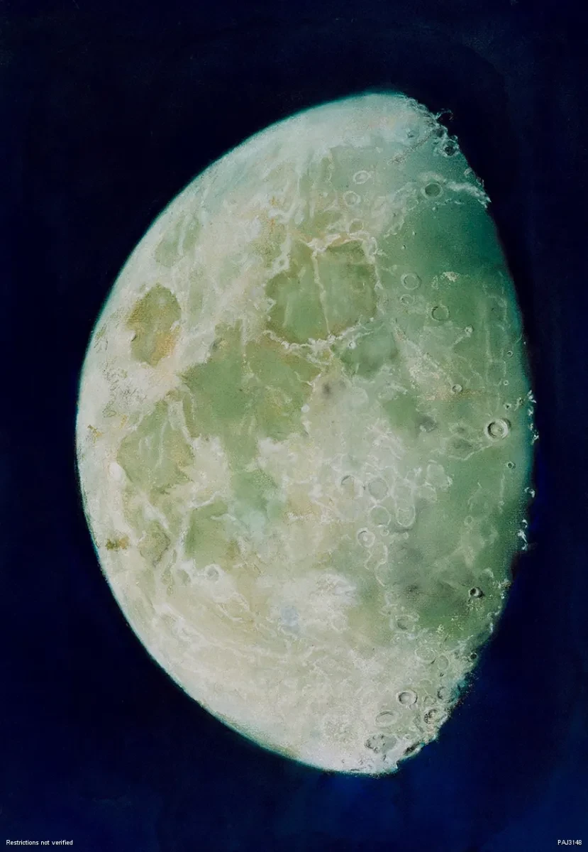 A detailed astronomy photograph of the partially-visible Moon.