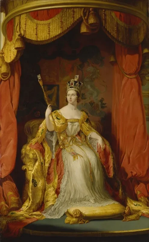 A portrait of a young Queen Victoria in a white, red and gold gown.