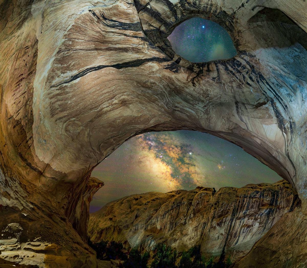 Milky Way seen through the opening of a cave