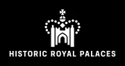 Historic Royal Palaces logo, featuring a white illustration of a castle in the centre surrounded by the dotted outline of a crown