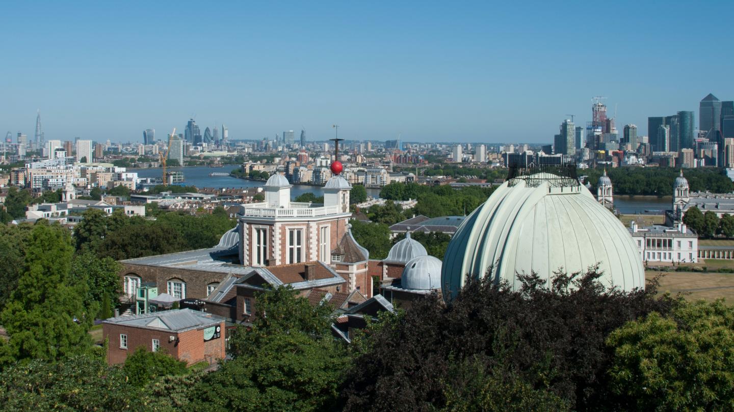 A view of the Royal Observatory, with London and the River Thames in the distance