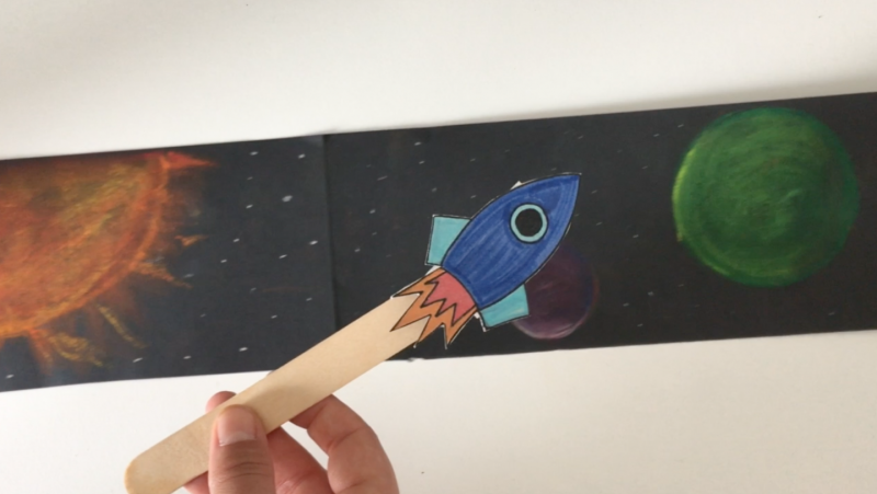 Homemade rocket travelling through paper space