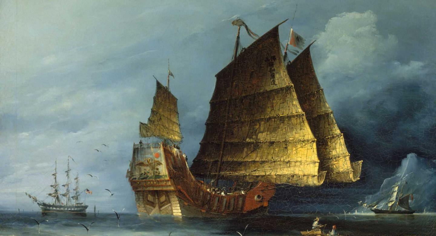 Collection painting with a large trading junk in the foreground with it's sails down and some smaller ships in the background