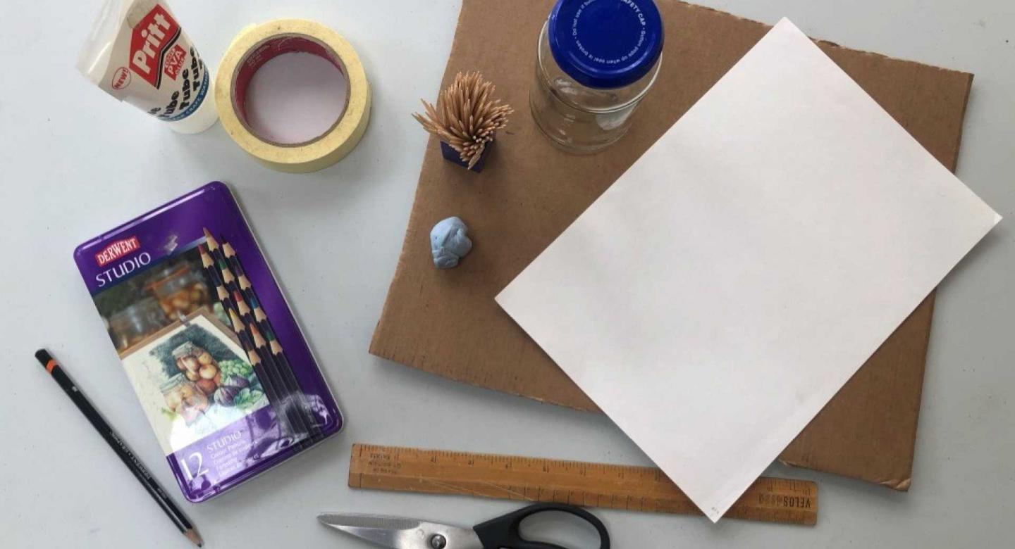 A glass jar, cardboard, plain paper, cocktail sticks, Blu tac, glue, tape, colouring pencils, pen