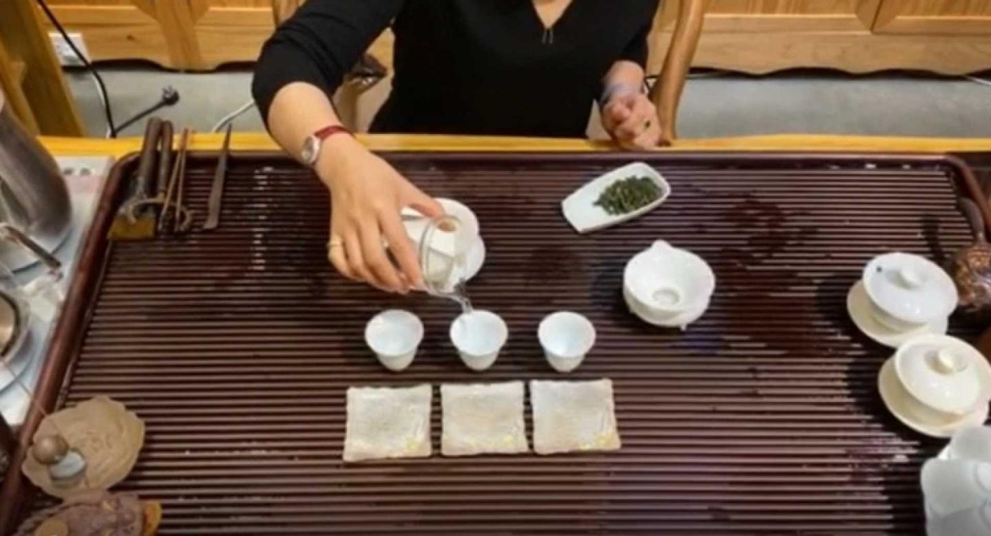 Chinese tea ceremony step 6 – rinse tea cups