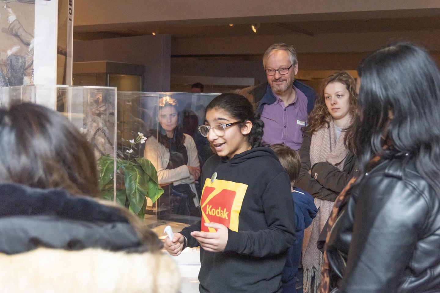 A young person delivering a tour in the galleries