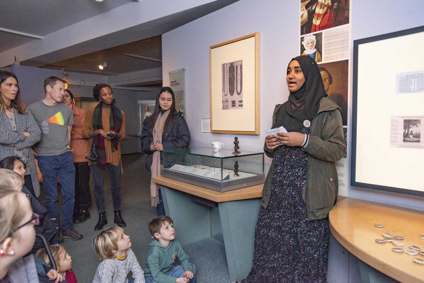 A young person delivering a tour in the galleries