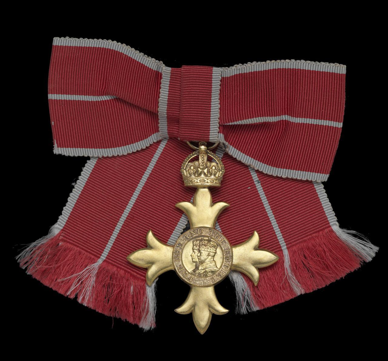 (Source of red ribbon with a golden badge picture)