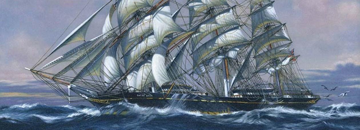 Ship at sea with billowing sails