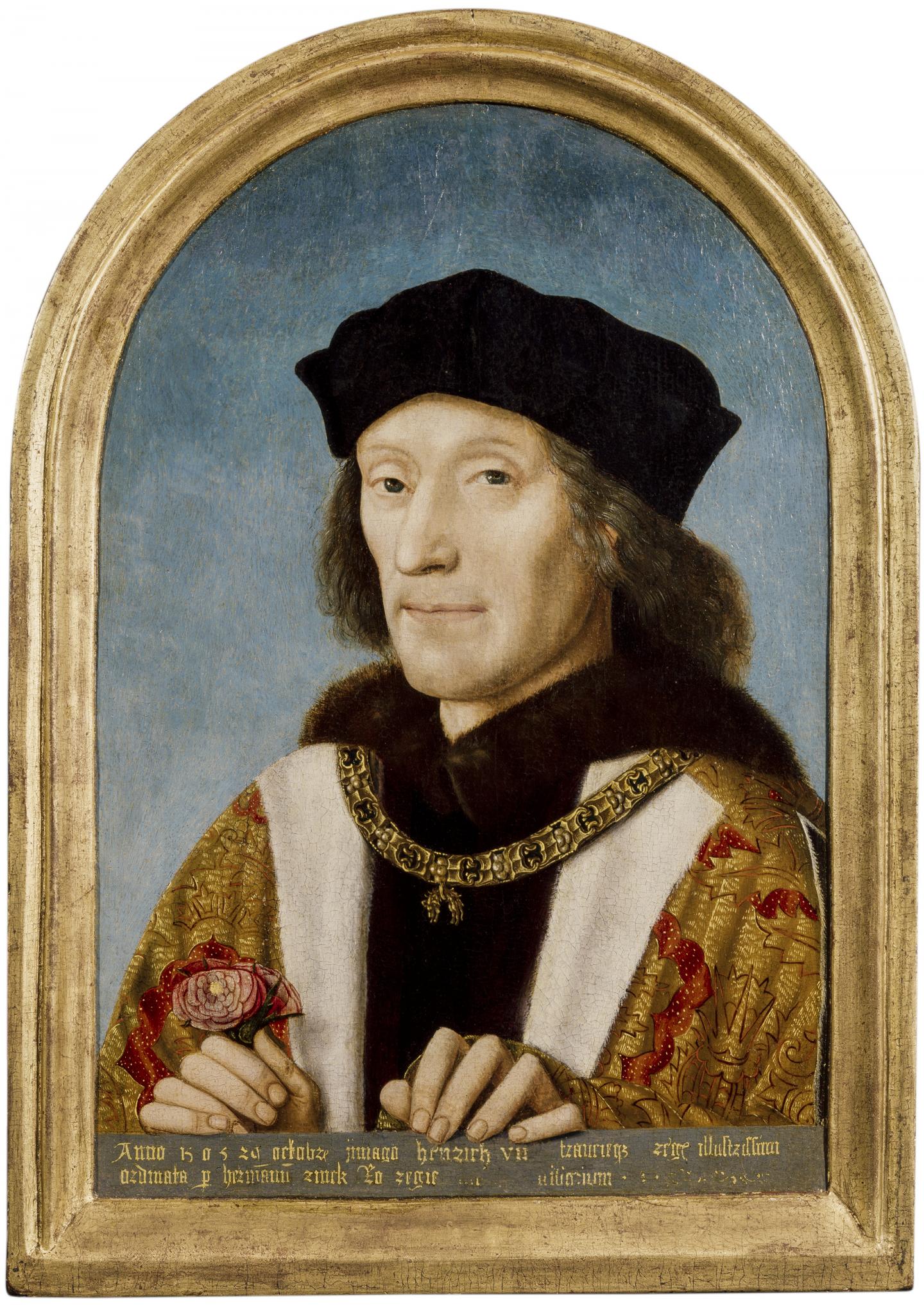 Henry VII wears a gold robe with a gold chain