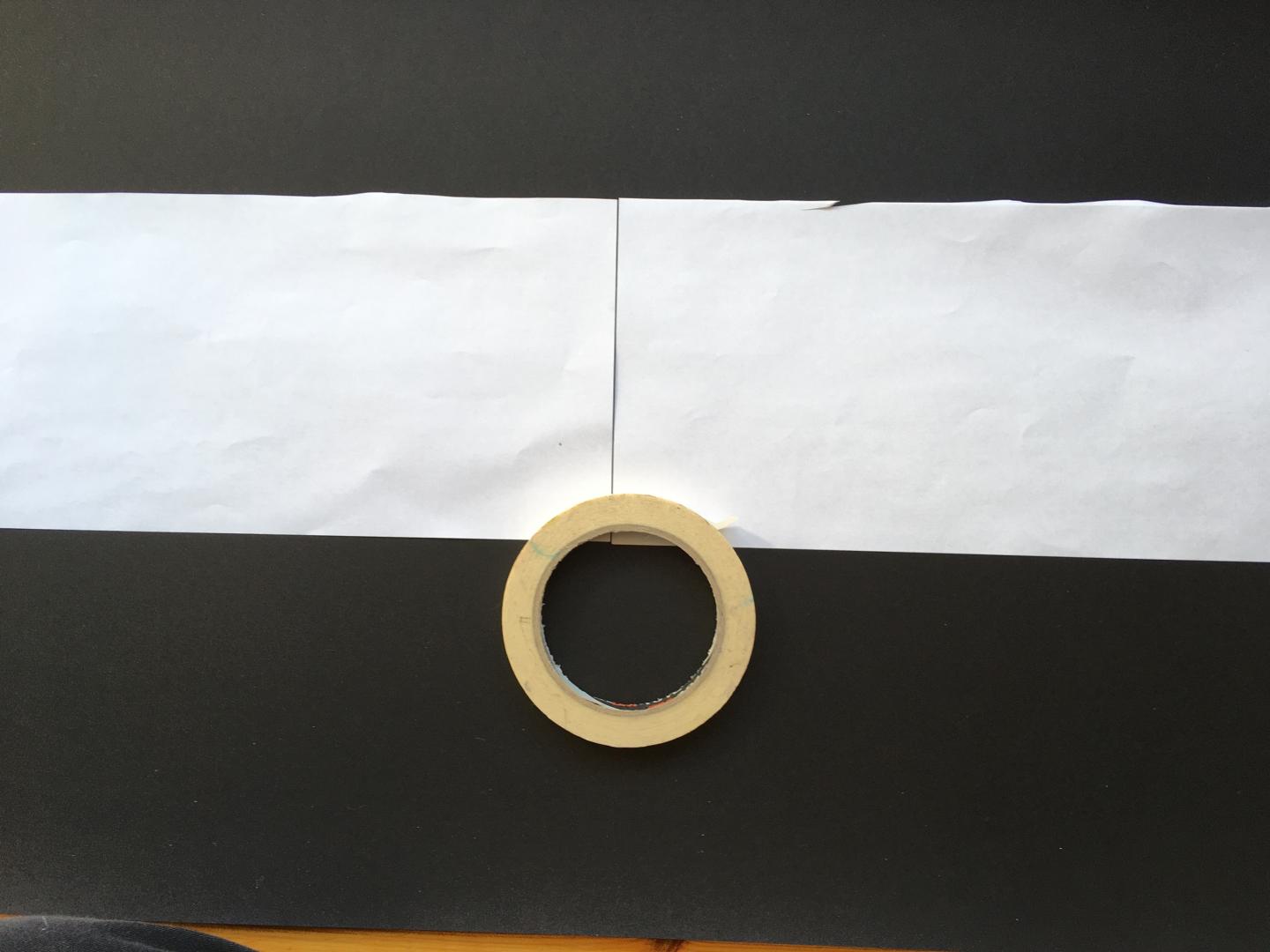stick two halves of A3 paper together along their short edges. 