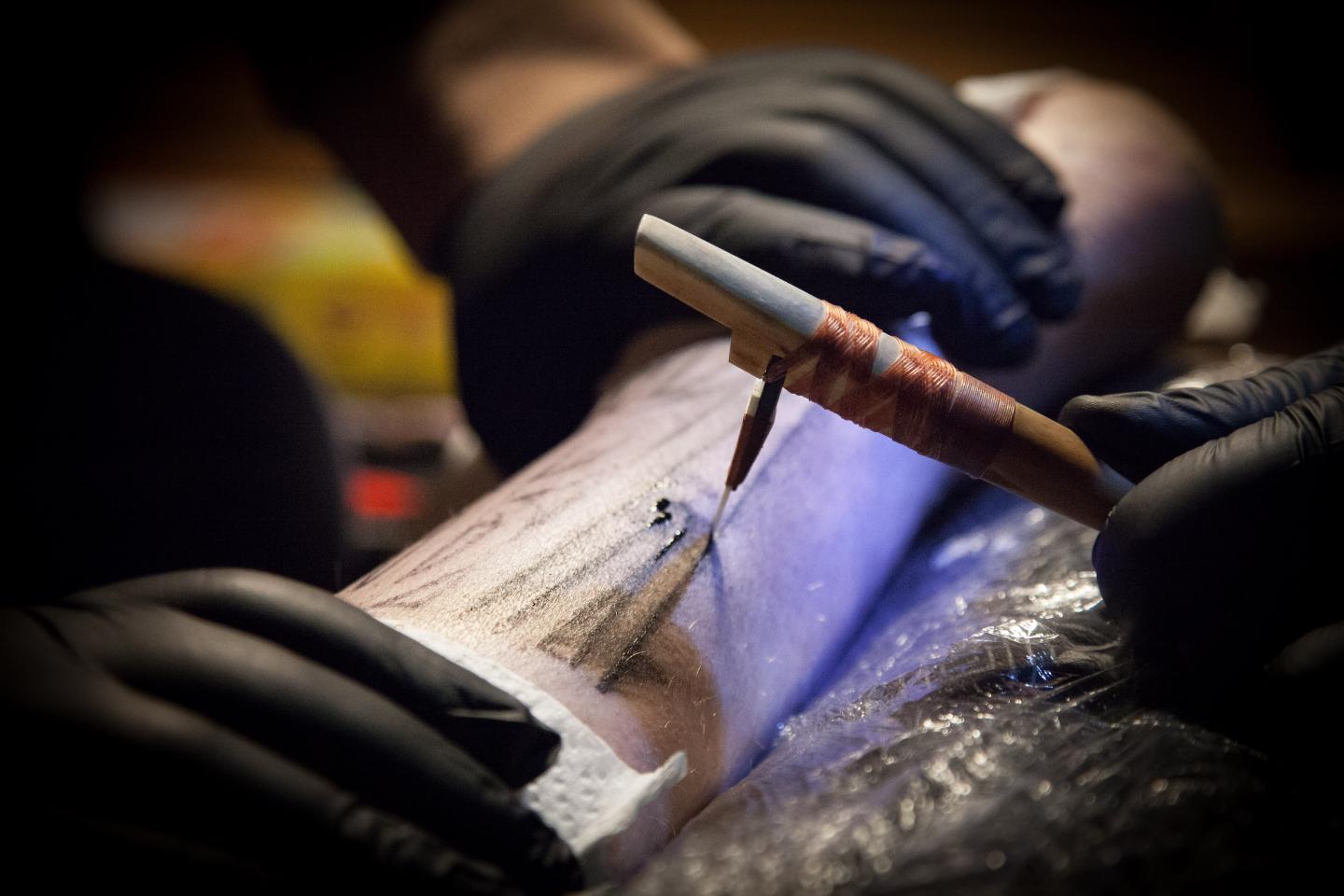 Te Rangitu Netana using traditional Ta Moko / Maori Tattooing