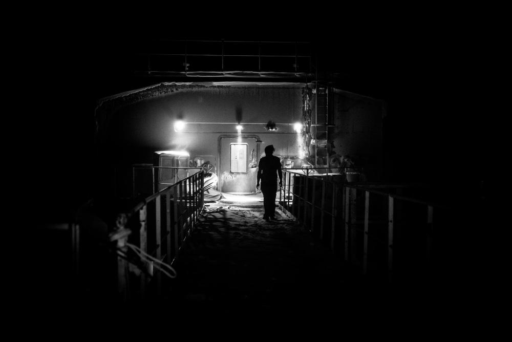 An image of the Exposure: Lives at Sea exhibition showing a lady outside the BAS Halley VI Research Station