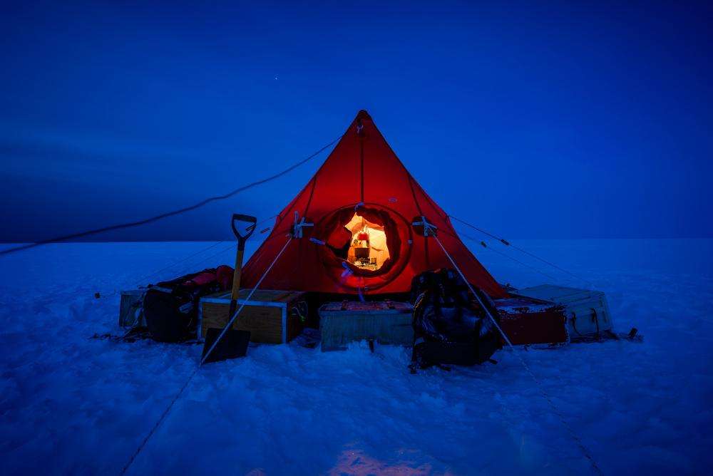 An image from the Exposure: Lives at Sea exhibition depicting a tent in Antarctic