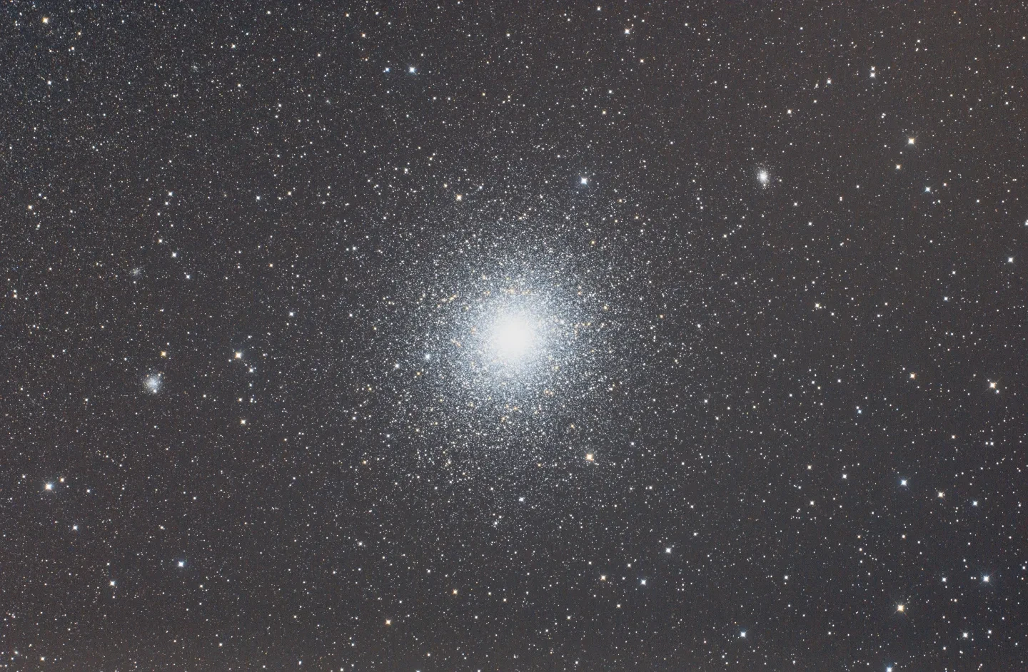 Bright satellite cluster