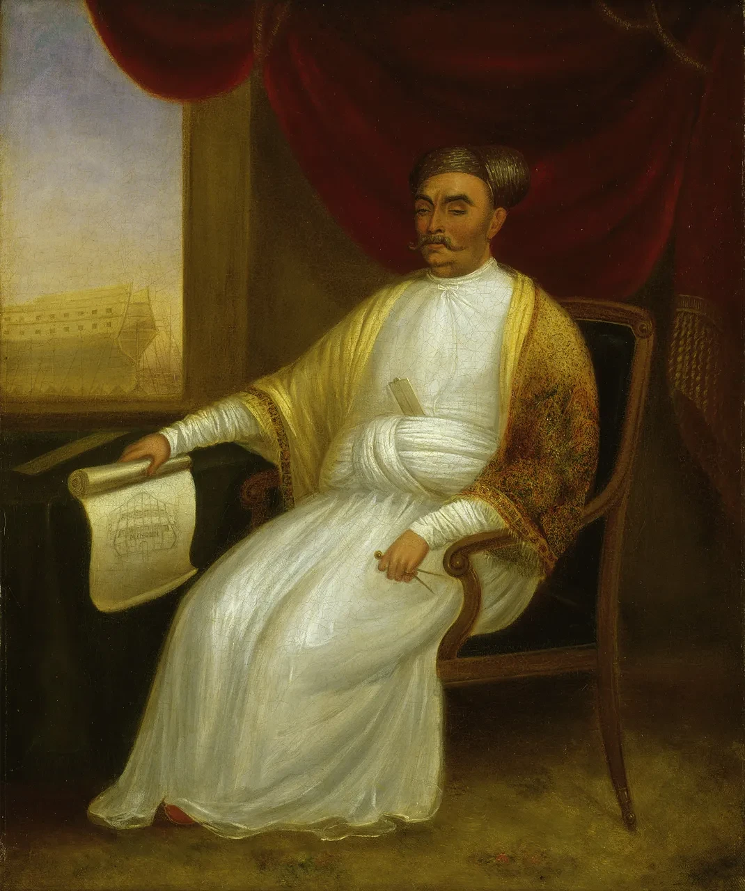 Portrait of a man dressed in a white robe and embroidered pashmina shawl
