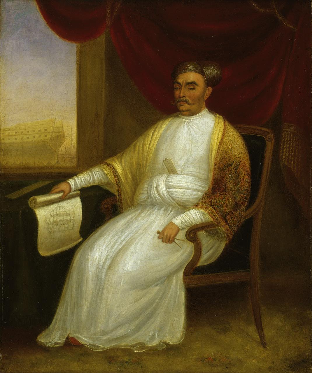 Portrait of a man dressed in a white robe and embroidered pashmina shawl
