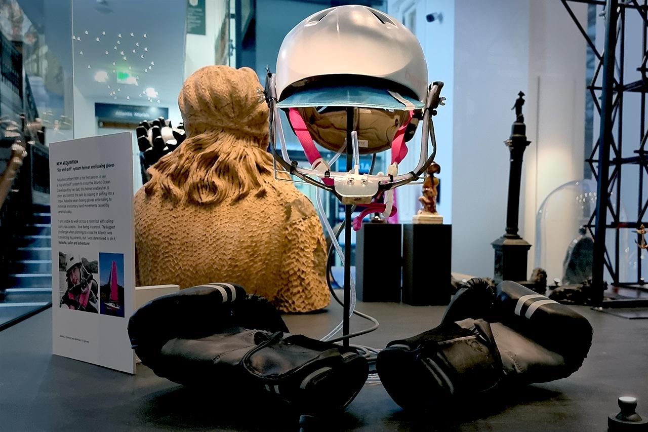 Natasha Lambert sip and puff helmet on display in the Sea Things gallery at the National Maritime Museum