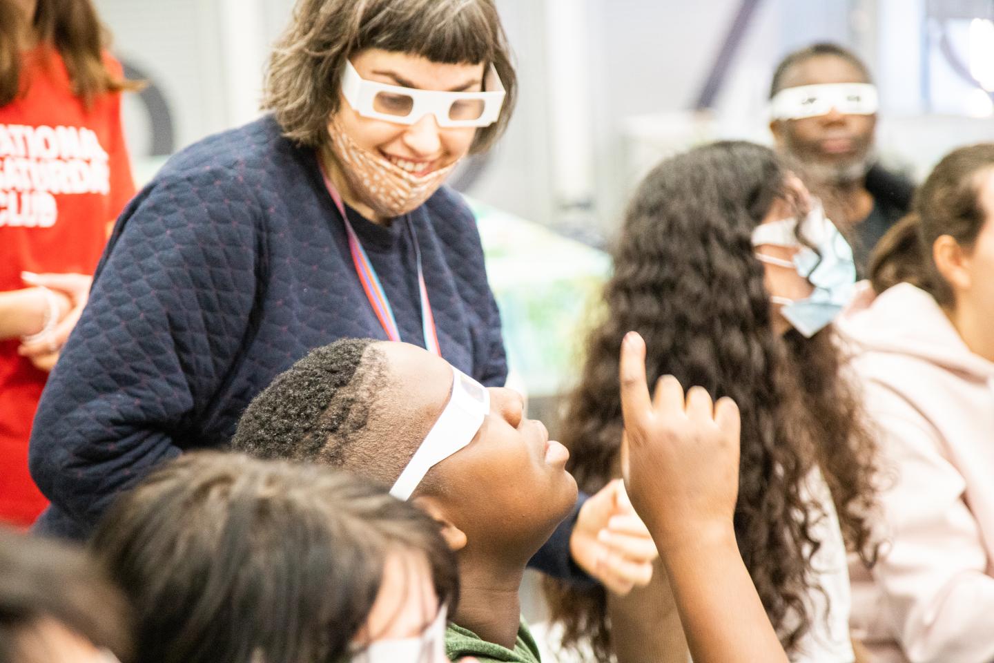 Young people wearing 3D glasses to look at environment
