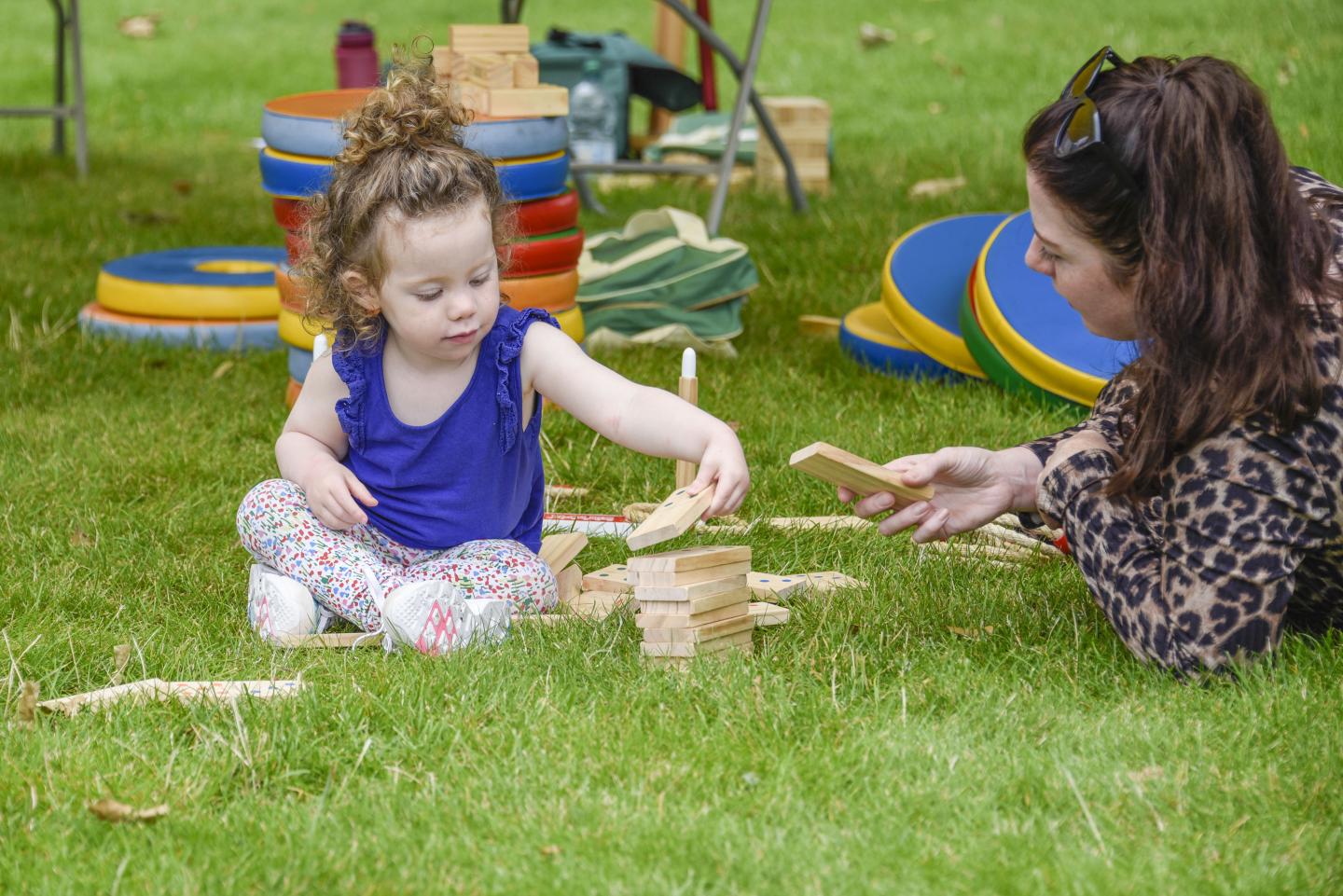 (source of mother and daughter playing with wooden blocks picture)