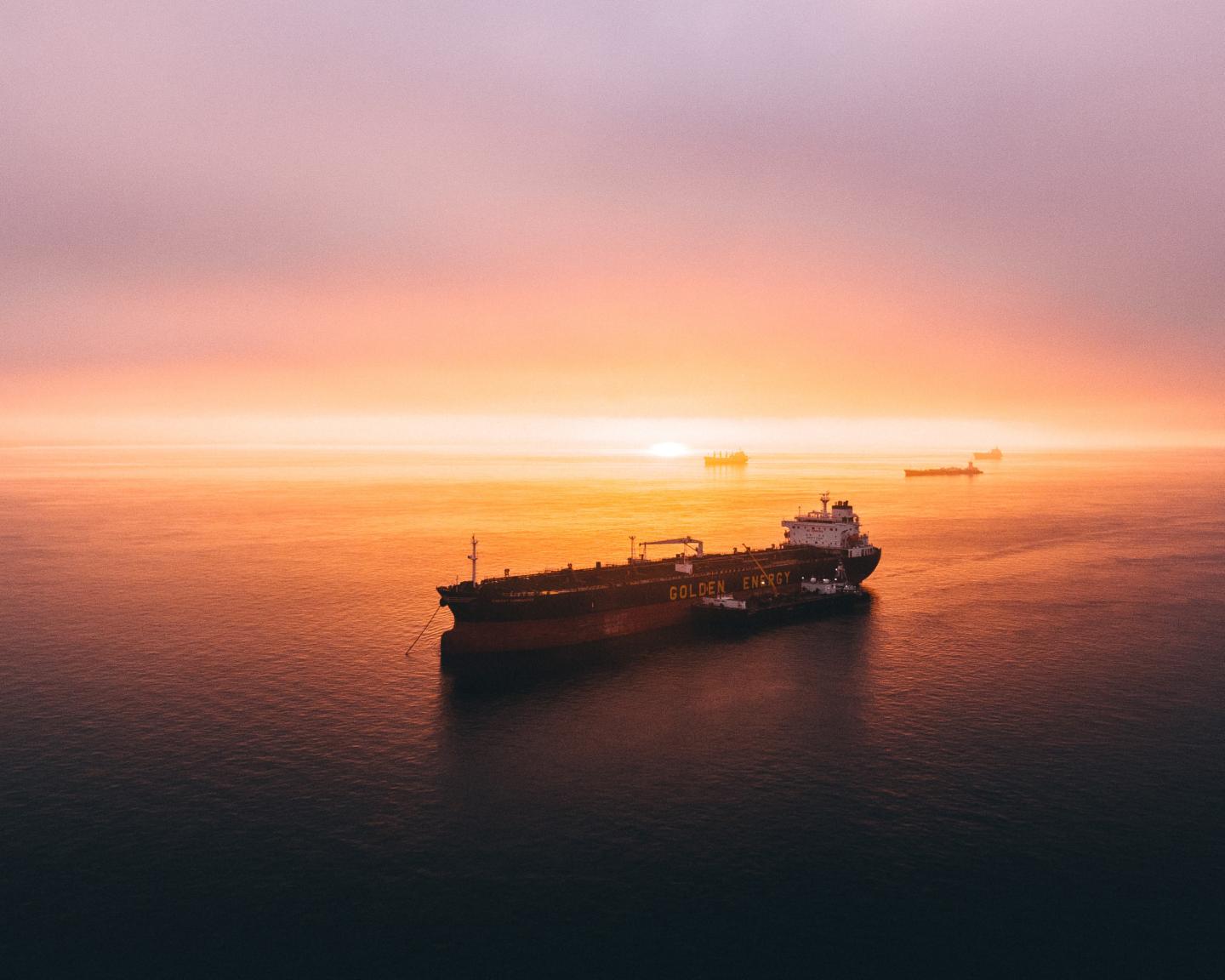 A container ship at sunset