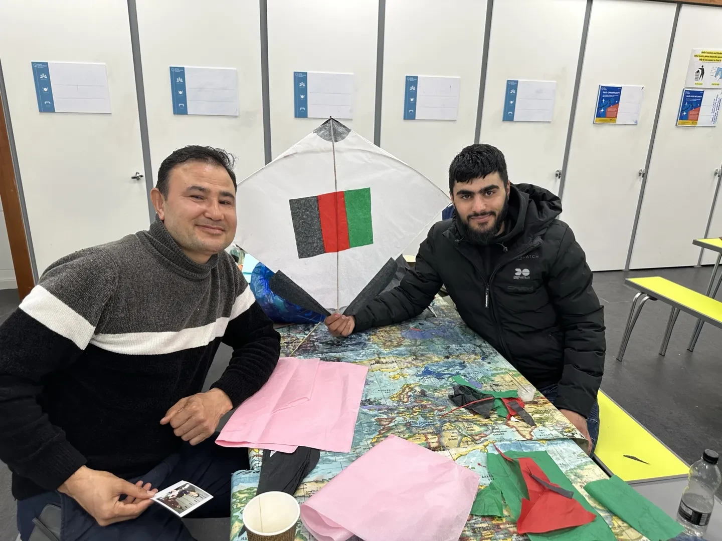 teacher and student with handmade kite