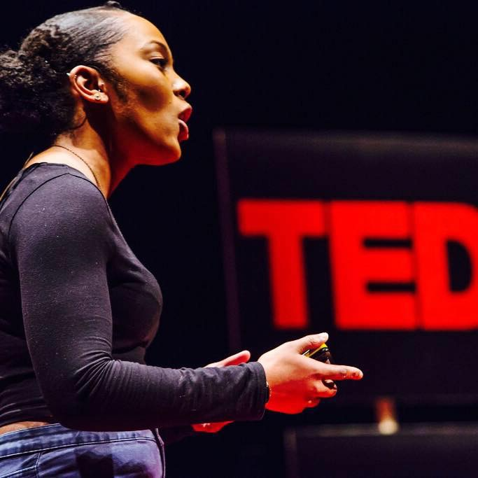 Image of Rasheeda Page-Muir giving a TEDx talk