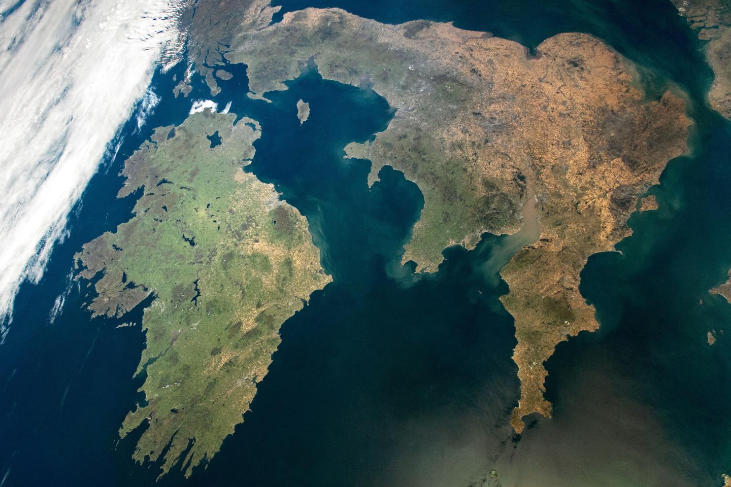 Satellite photograph of Great Britain and Ireland during the summer 2022 heatwave. Large swathes of brown in the south and east of England show how the heat has affected the country